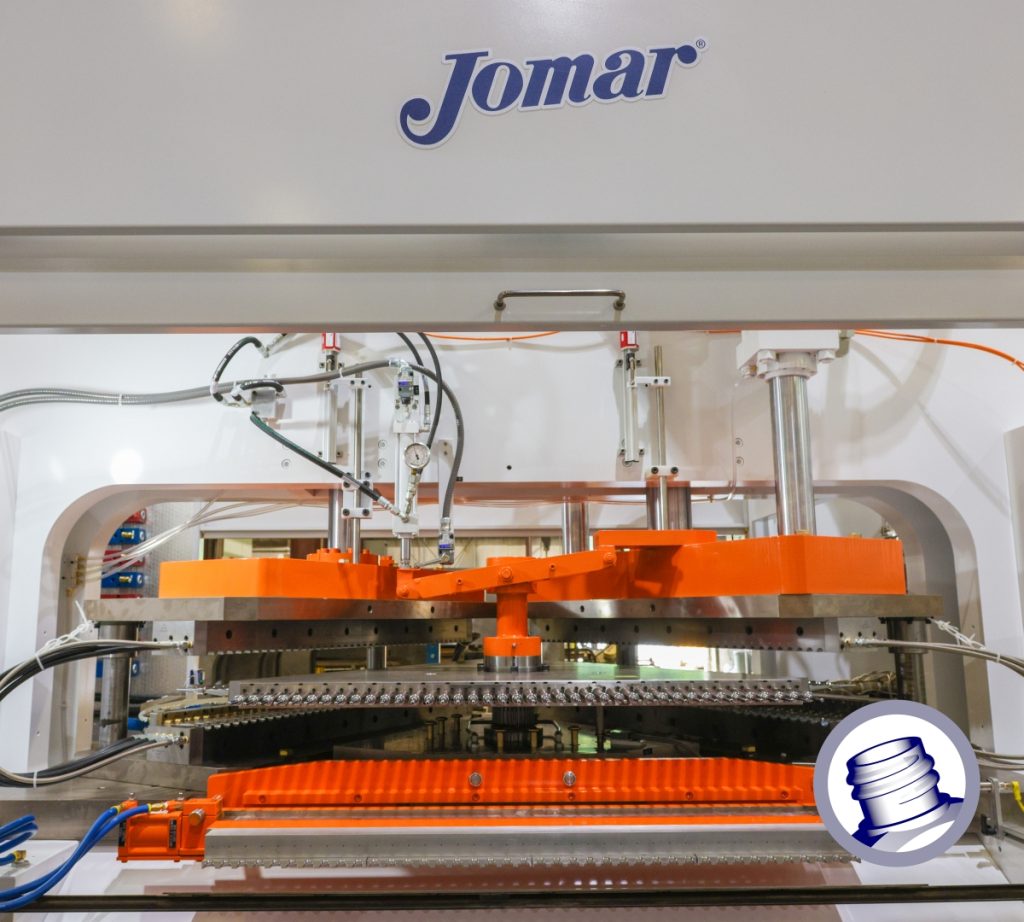 Wide angle view of a Jomar 175ton blow molding machine.