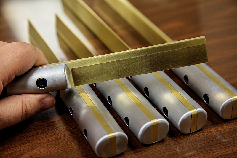 Brass preform stripper