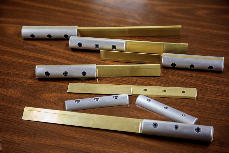 Brass preform strippers